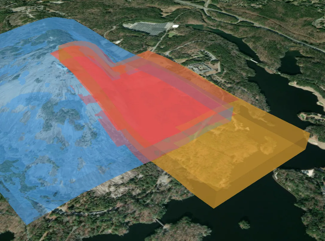 Two overlapping tessellated airspaces in the Cesium viewer with conflicting cells highlighted in a distinct color